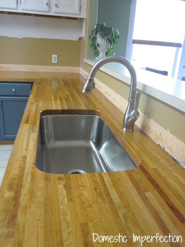 butcher block kitchen countertop with stainless steel undermount sink