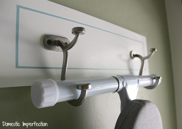 DIY ironing board holder