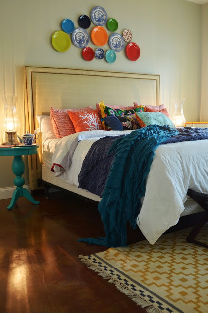colorful plates over bed