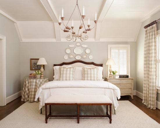 white plates above bed
