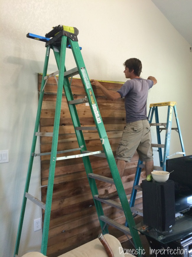 installing a rustic wood accent wall