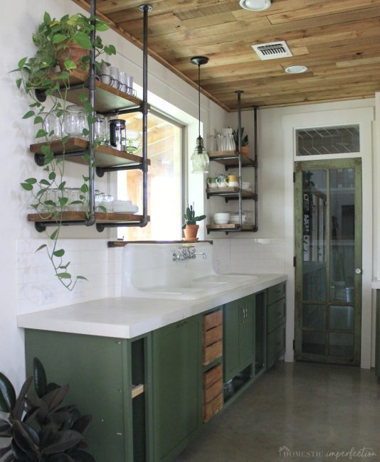 rustic kitchen with painted cabinets and open shelving