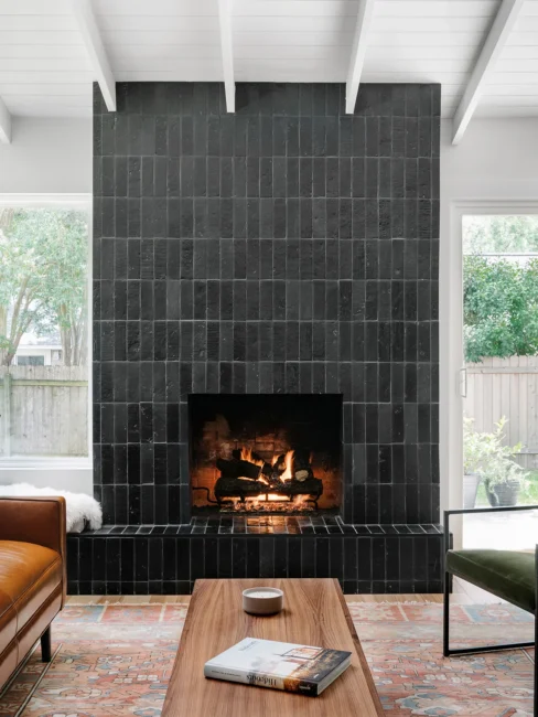 Modern black vertical tile fireplace