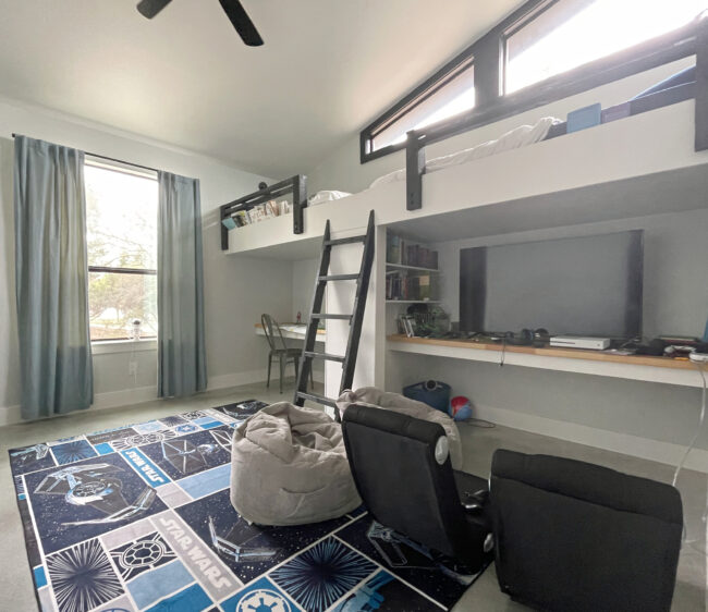 kids bedroom with lofts and desks