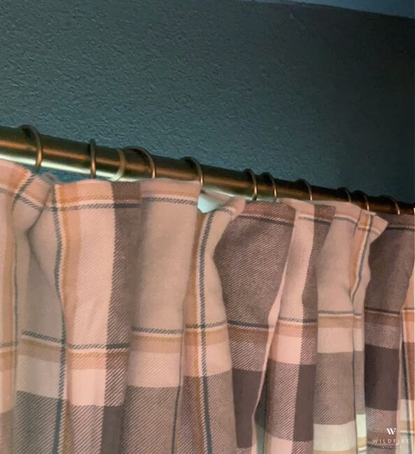 How to make a curtain out of a bedsheet. Easy, cheap, and turns out better looking than you would think.