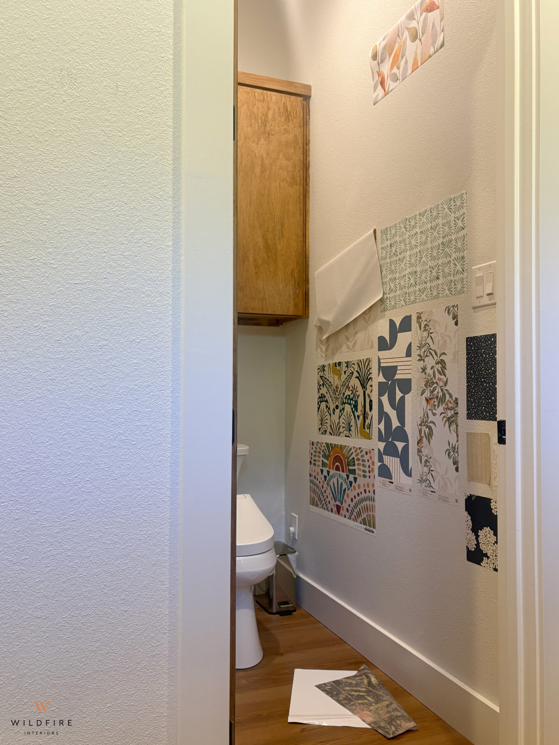Peel-and-stick wallpaper falling off textured walls. 