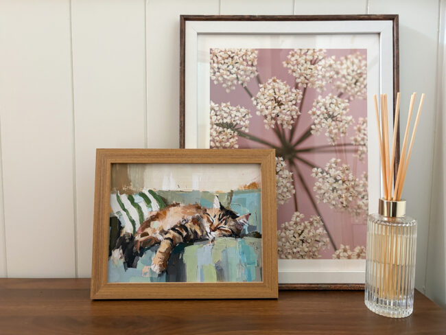 artwork in teen girl bedroom - pink floral, watercolor cat